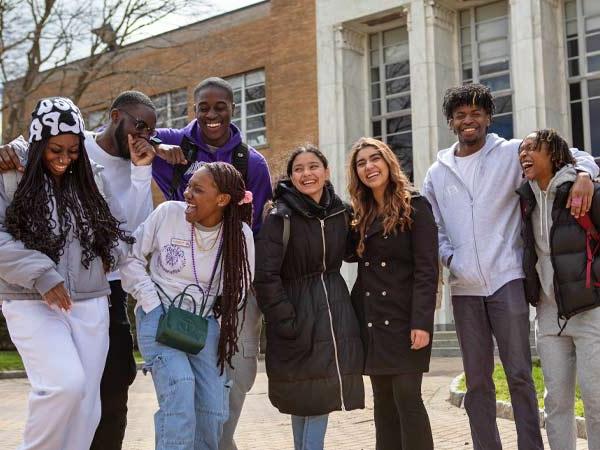 group of high school students laughing